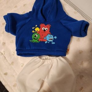 Build-a-Bear Workshop blue hoodie and white capris.